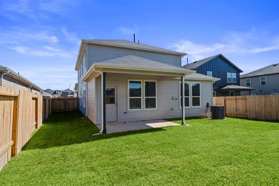 Exterior details and patio area of a home in Montgomery Bend, Montgomery (Image 4).
