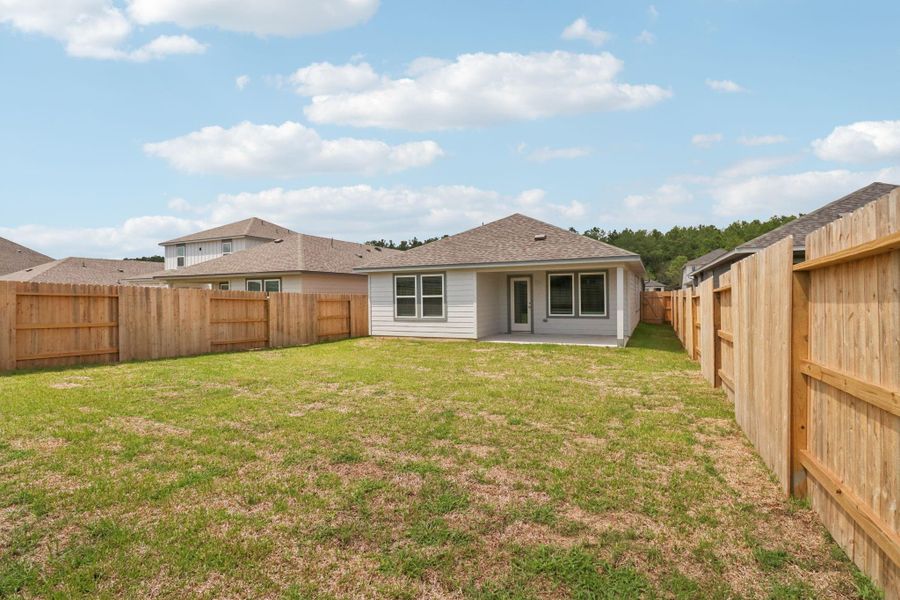 Front exterior of a new home in Landing Meadows - Traditional Series, New Caney, TX, highlighting curb appeal (Image 2). Front exterior of a new home in Landing Meadows - Traditional Series, New Caney, TX, highlighting curb appeal (Image 2).