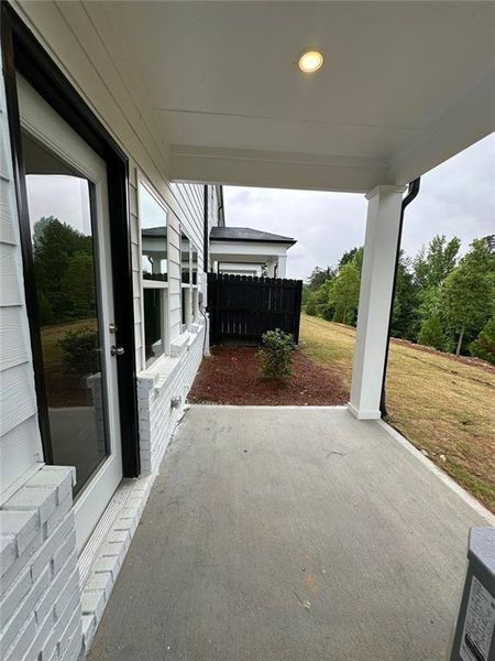 Exterior details and patio area of a home in Terrace at Riverview Landing, Smyrna (Image 15).