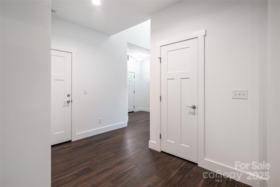 Foyer- garage, powder room and laundry to left, understair storage right Foyer- garage, powder room and laundry to left, understair storage right
