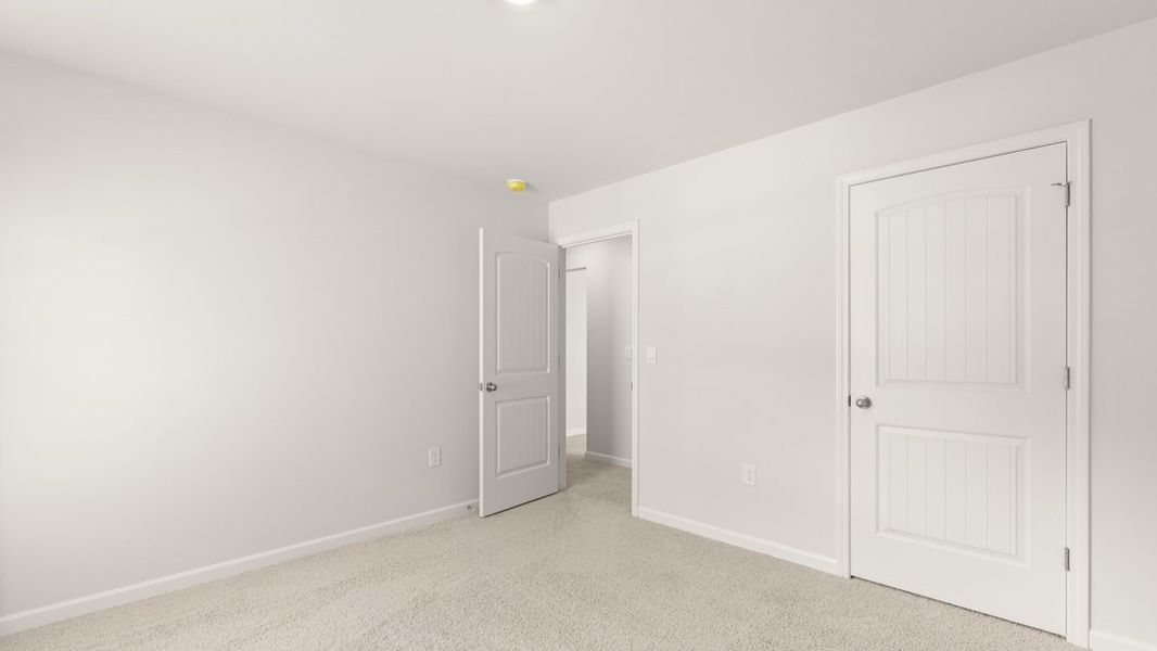 Representative unfurnished interior of a home built from the Halton by D.R. Horton in Liberty Crossing, Braselton (Image 26).