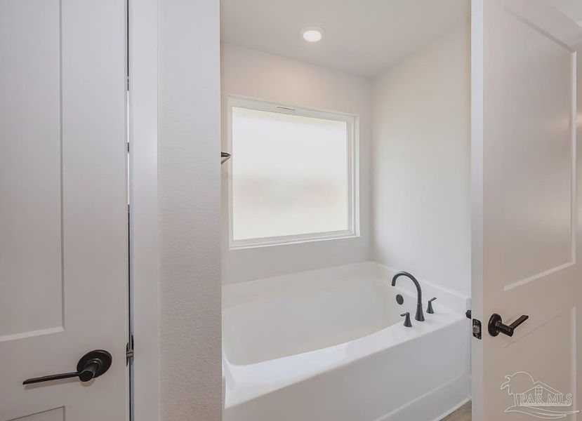 Furnished interior view inside a new home in Hidden Pines Estates, Milton (Image 10).