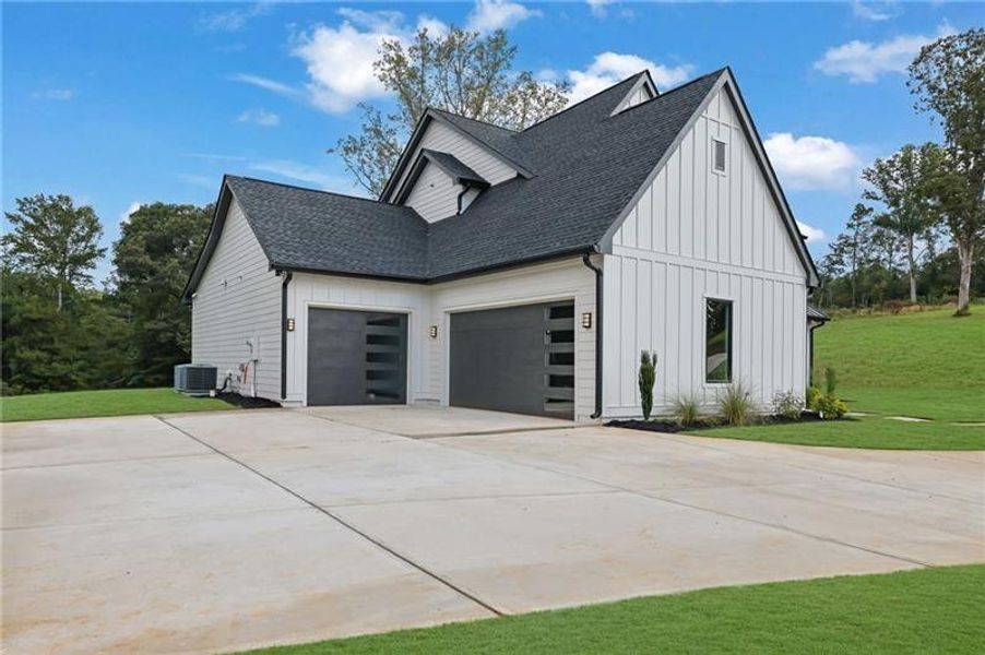 Front exterior of a new home in , Canton, GA, highlighting curb appeal (Image 33).