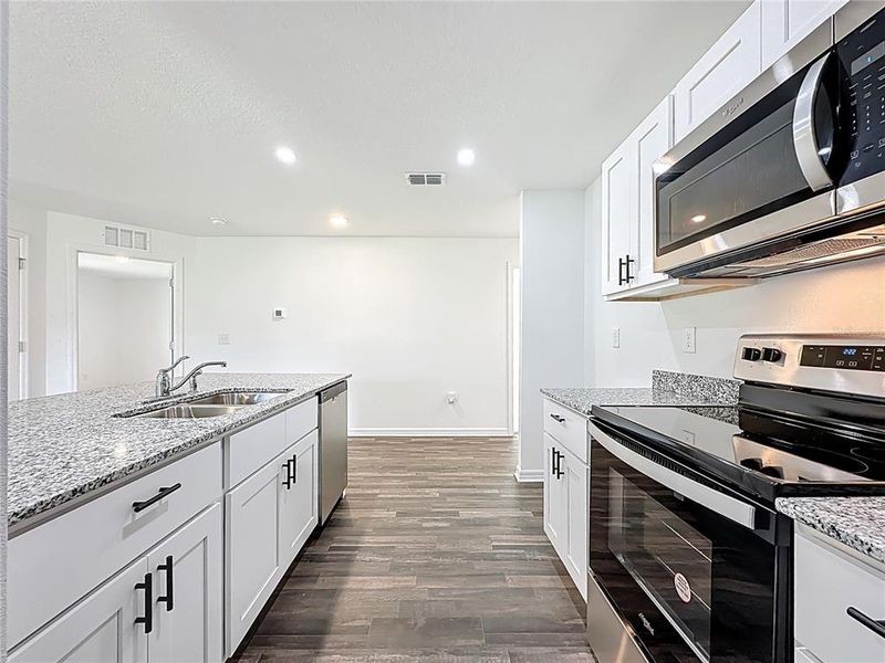 Furnished interior view inside a new home in , Crescent City (Image 6).