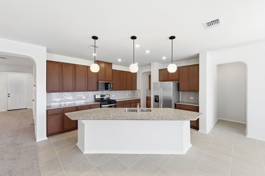 Furnished interior view inside a new home in River Bluff, Leander (Image 5).