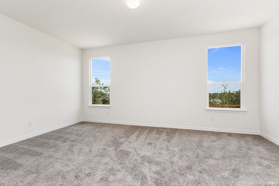 Spacious, unfurnished interior of a new home in Hidden Bluffs at TRP, San Antonio (Image 14).