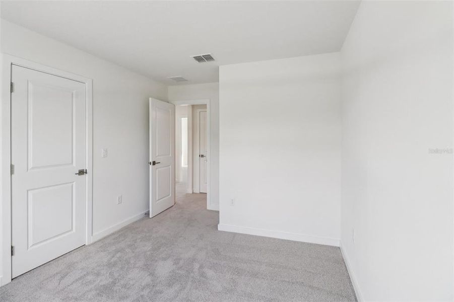 Spacious, unfurnished interior of a new home in Cyrene at Harmony, St. Cloud (Image 21).