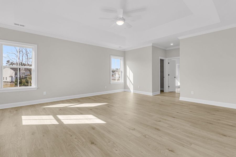 Spacious, unfurnished interior of a new home in Tidewater at Lakes of Cane Bay, Summerville (Image 23). Spacious, unfurnished interior of a new home in Tidewater at Lakes of Cane Bay, Summerville (Image 23).