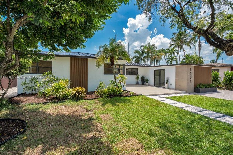 Front exterior of a new home in , Fort Lauderdale, FL, highlighting curb appeal (Image 25). Front exterior of a new home in , Fort Lauderdale, FL, highlighting curb appeal (Image 25).