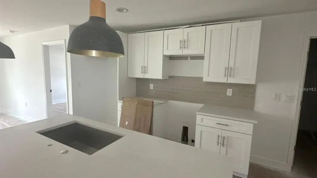 Furnished interior view inside a new home in , Port Charlotte (Image 9).