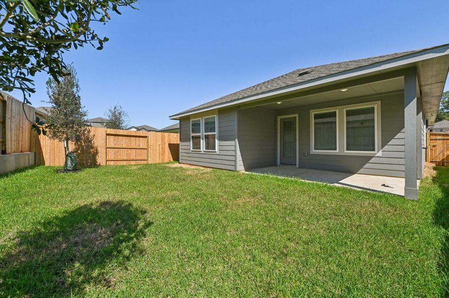 Exterior details and patio area of a home in Montgomery Oaks - Premier, Conroe (Image 2). Exterior details and patio area of a home in Montgomery Oaks - Premier, Conroe (Image 2).