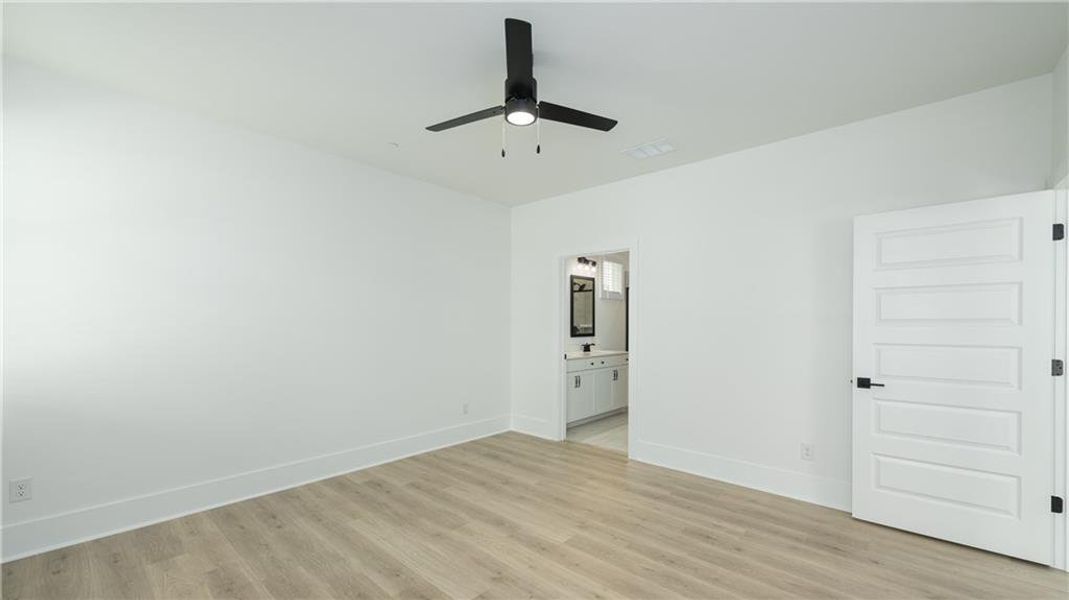 Spacious, unfurnished interior of a new home in The Village at Sandy Plains, Marietta (Image 13).