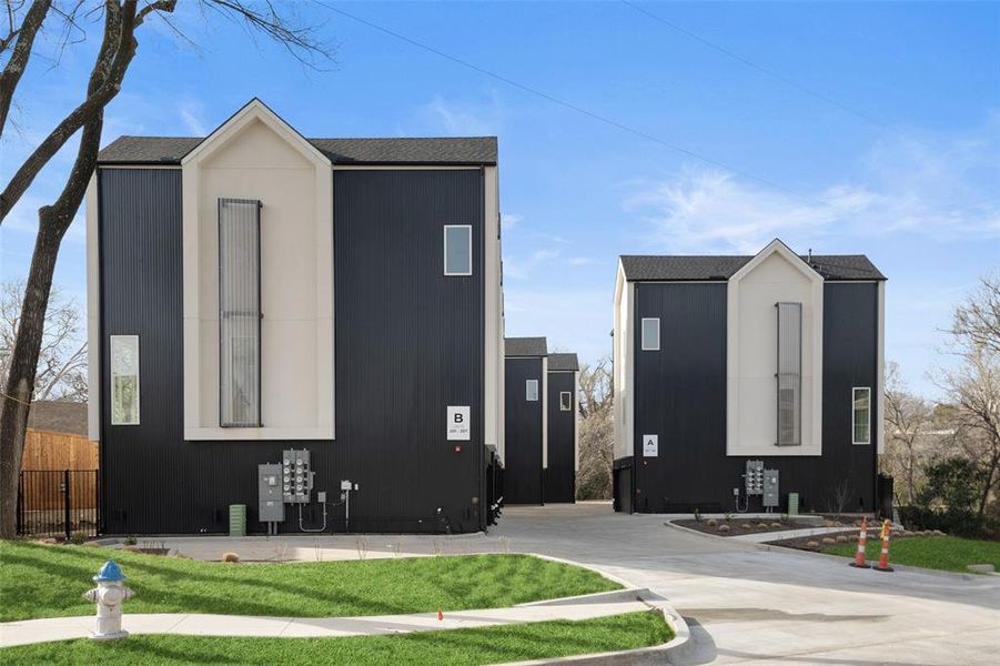 Front exterior of a new home in , Dallas, TX, highlighting curb appeal (Image 20).