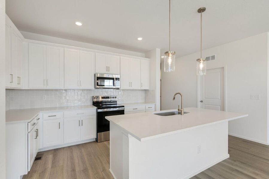 Furnished interior view inside a new home in Murphy Creek Reserve, Aurora (Image 8).