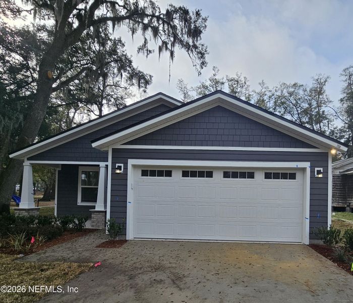 Front exterior of a new home in , Jacksonville, FL, highlighting curb appeal (Image 17).