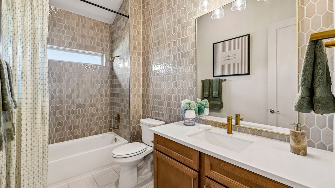 Representative furnished interior of a home built from the Oleander by DRB Homes in Infinity Square, Kyle (Image 6).