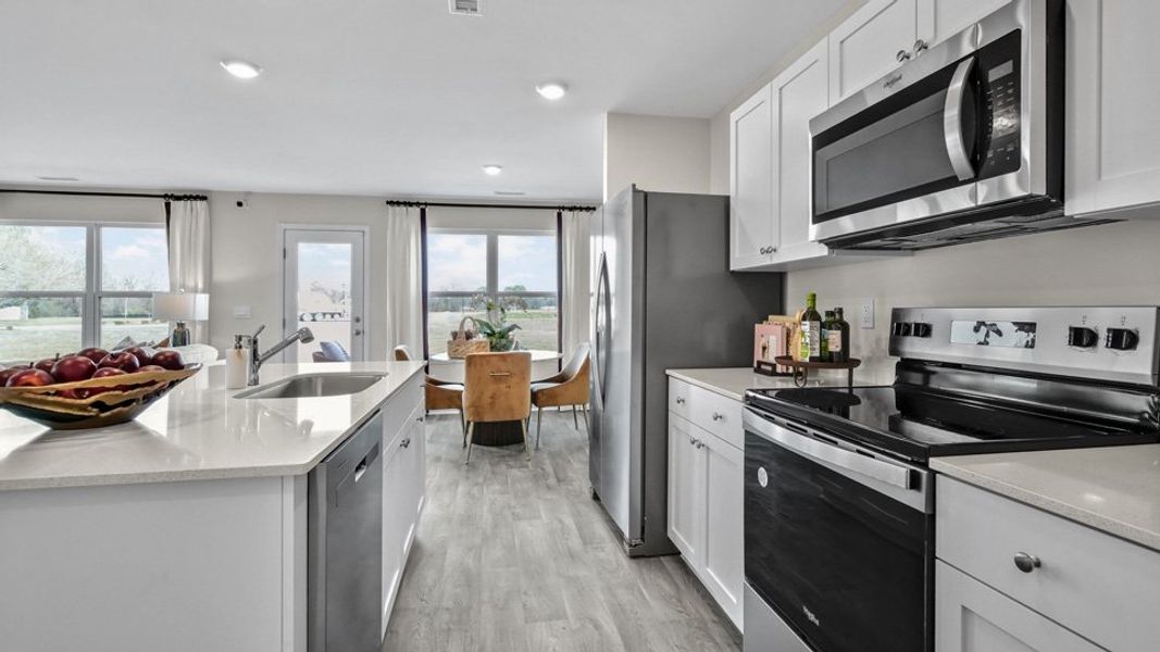 Furnished interior view inside a new home in North Village Townes, Greensboro (Image 9).