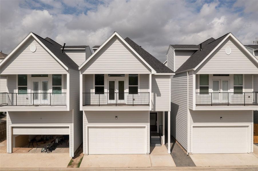 Front exterior of a new home in , Houston, TX, highlighting curb appeal (Image 2).