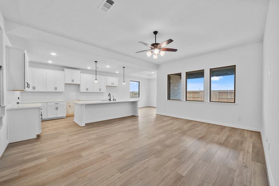 With a nod to rustic farmhouse living, this family room is full of sunshine.