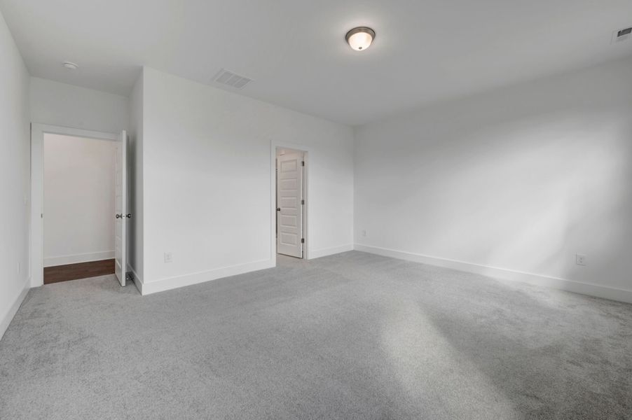 Spacious, unfurnished interior of a new home in McAlister Creek, Clayton (Image 20).
