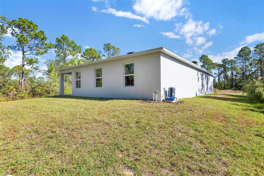 Exterior details and patio area of a home in Sun 'N Lake Classic at Sun 'N Lake, Sebring (Image 12). Exterior details and patio area of a home in Sun 'N Lake Classic at Sun 'N Lake, Sebring (Image 12).