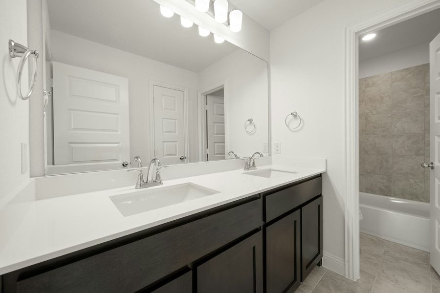 Furnished interior view inside a new home in Stone Eagle, Azle (Image 14).