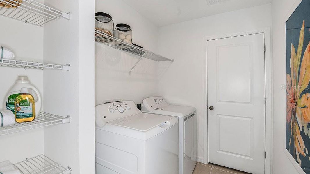 Furnished interior view inside a new home in Cove at Coasterra, Palmetto (Image 14).