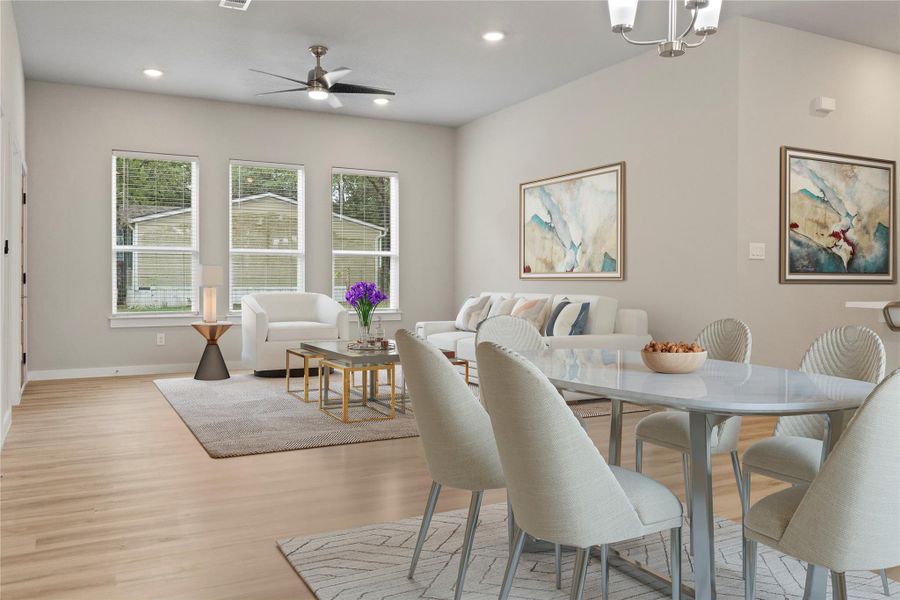 A stunning dining and living area bathed in natural light—perfect for making it your new home! (virtually staged) A stunning dining and living area bathed in natural light—perfect for making it your new home! (virtually staged)