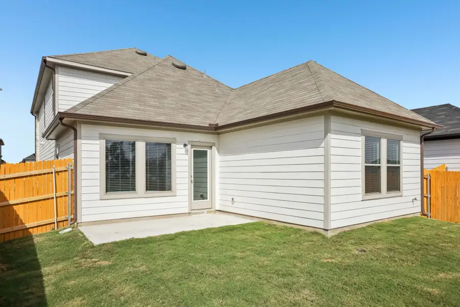 Exterior details and patio area of a home in Trinity Ranch, Elgin (Image 23).