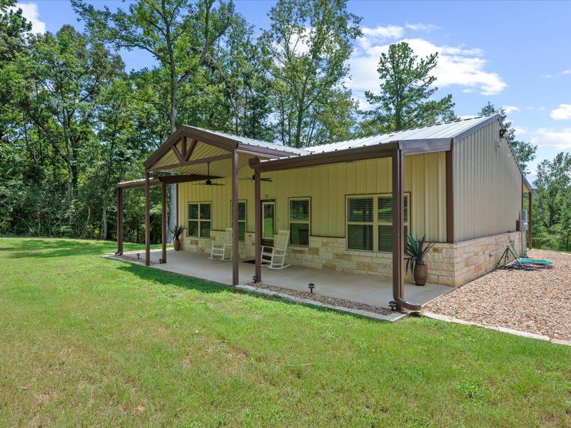 Front exterior of a new home in , Centerville, TX, highlighting curb appeal (Image 19).