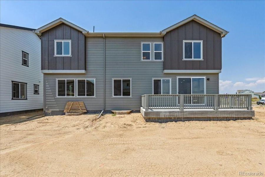 Front exterior of a new home in Prestige Collection at Parkdale Commons, Lafayette, CO, highlighting curb appeal (Image 2). Front exterior of a new home in Prestige Collection at Parkdale Commons, Lafayette, CO, highlighting curb appeal (Image 2).