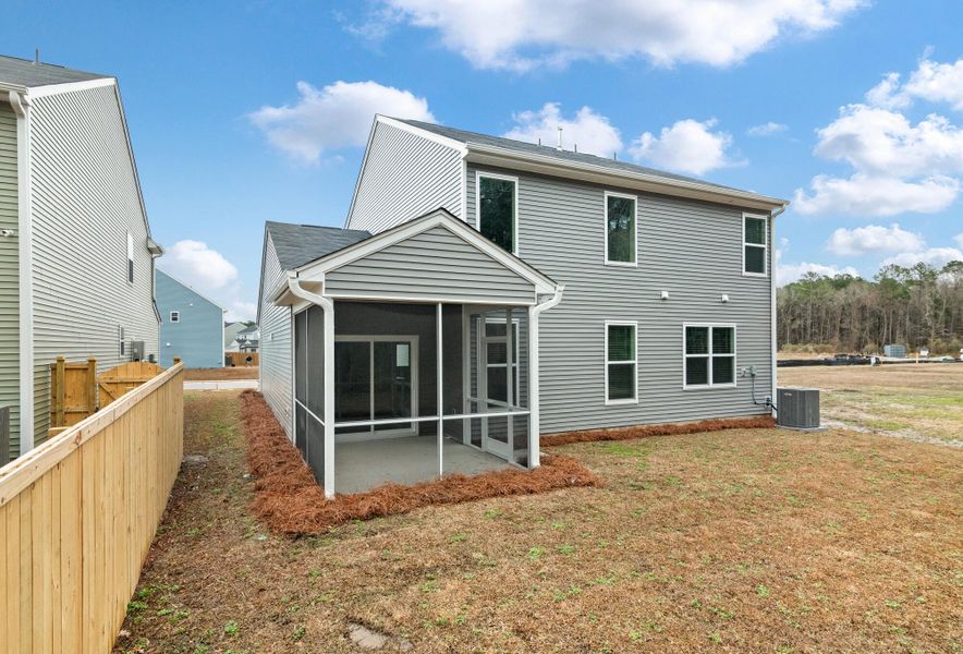 Exterior details and patio area of a home in Oakley Pointe, Moncks Corner (Image 25).