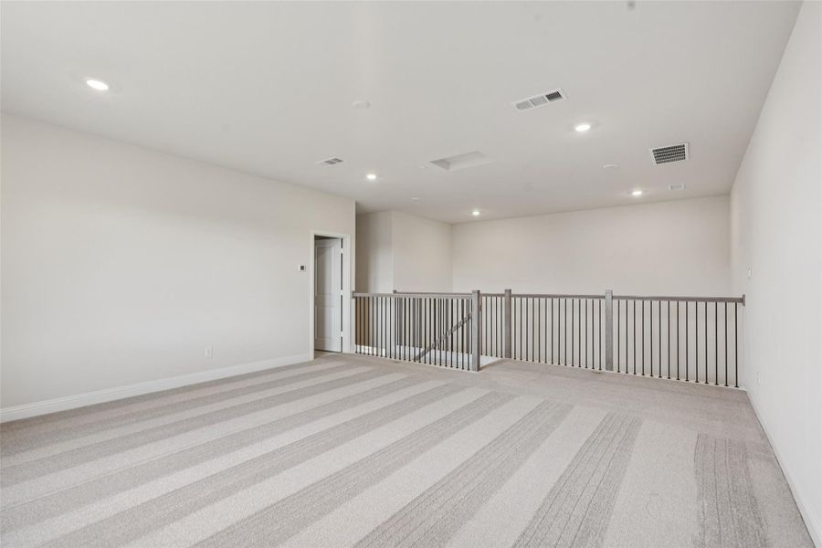 Spacious, unfurnished interior of a new home in Sienna 65', Missouri City (Image 25).
