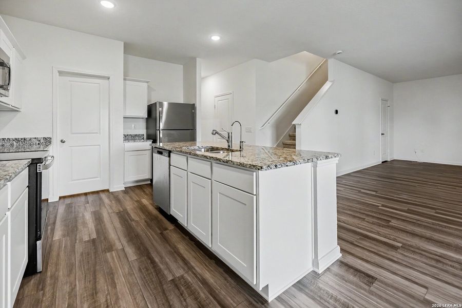 Furnished interior view inside a new home in Hennersby Hollow, San Antonio (Image 7).