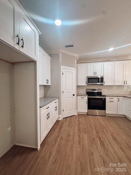 Furnished interior view inside a new home in , Monroe (Image 4). Furnished interior view inside a new home in , Monroe (Image 4).