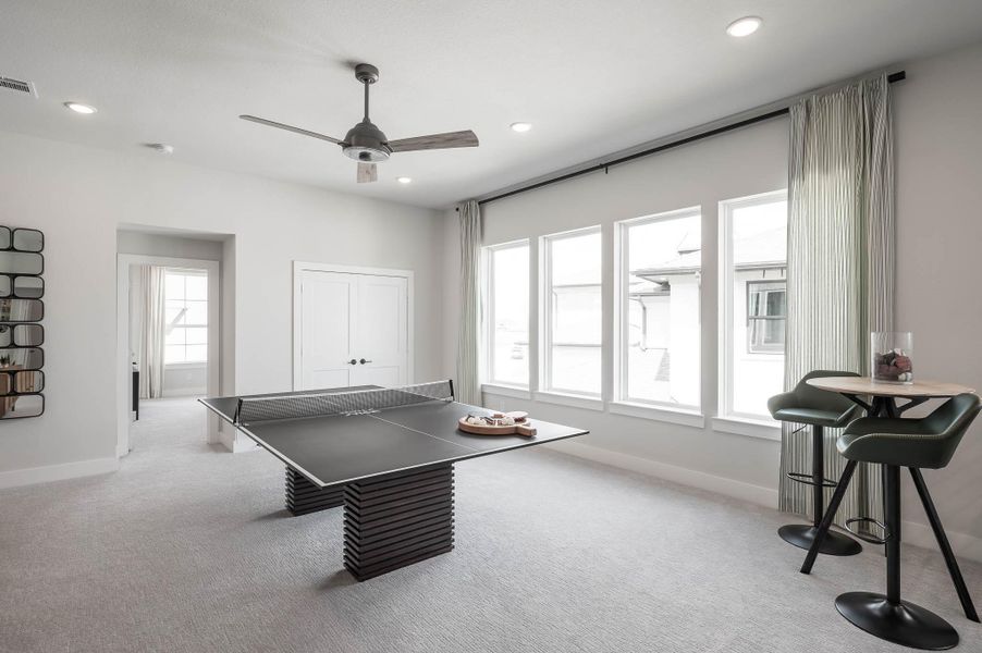 Furnished interior view inside a new home in Bridgeland, Cypress (Image 28).