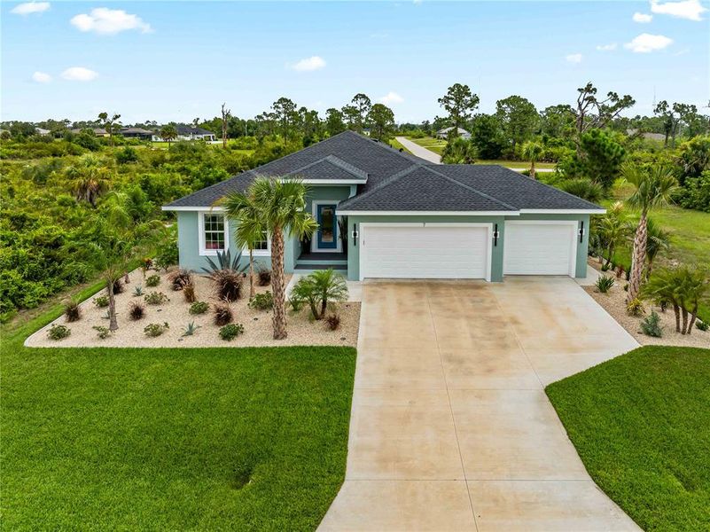 Front exterior of a new home in , Placida, FL, highlighting curb appeal (Image 26).