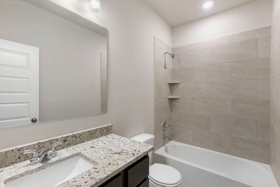 Representative furnished interior of a home built from the The 1475 by Stylecraft Builders in Arroyo Ranch, Seguin (Image 8).