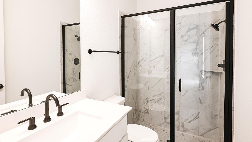 Furnished interior view inside a new home in 6 Creeks, Kyle (Image 12).