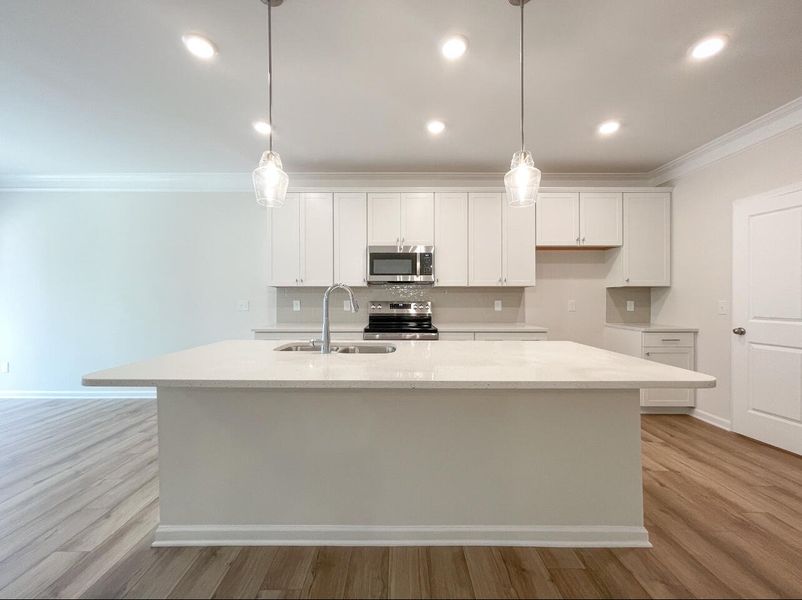 Furnished interior view inside a new home in Attenborough Townhomes, Piedmont (Image 8). Furnished interior view inside a new home in Attenborough Townhomes, Piedmont (Image 8).