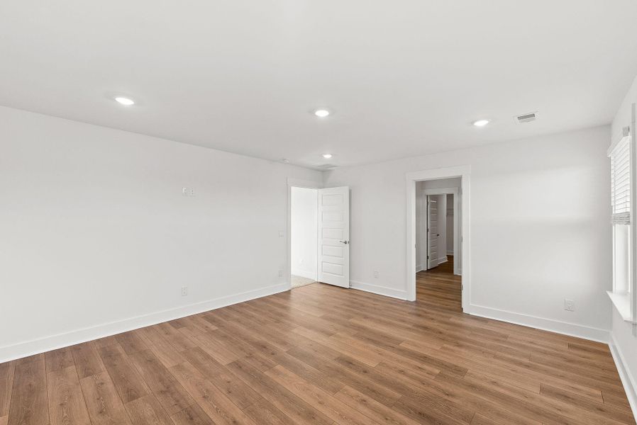 Spacious, unfurnished interior of a new home in The Coves at Lakes of Cane Bay, Summerville (Image 46). Spacious, unfurnished interior of a new home in The Coves at Lakes of Cane Bay, Summerville (Image 46).