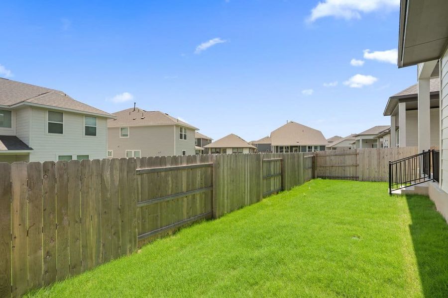 Exterior details and patio area of a home in Lariat, Liberty Hill (Image 26). Exterior details and patio area of a home in Lariat, Liberty Hill (Image 26).
