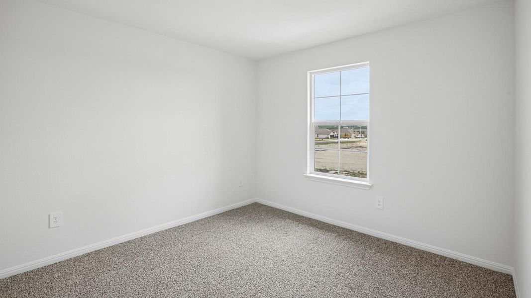 Spacious, unfurnished interior of a new home in Bar W Ranch, Leander (Image 27).