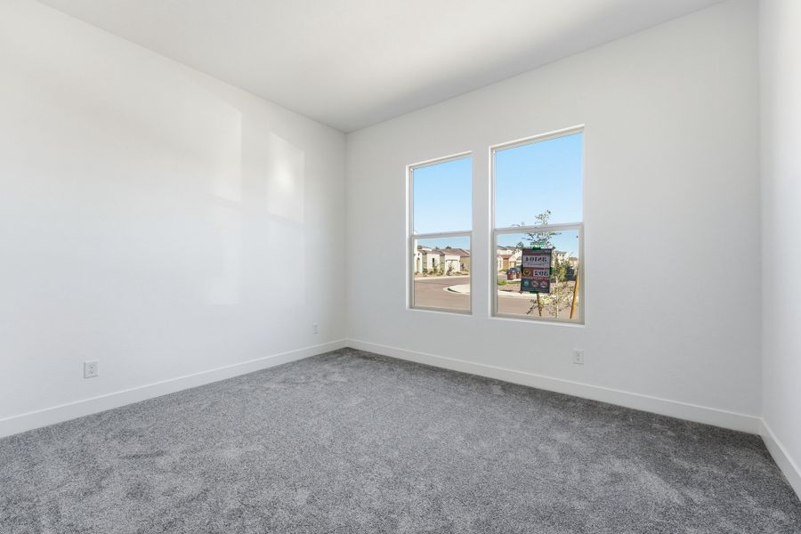 Spacious, unfurnished interior of a new home in Combs Ranch, San Tan Valley (Image 31).