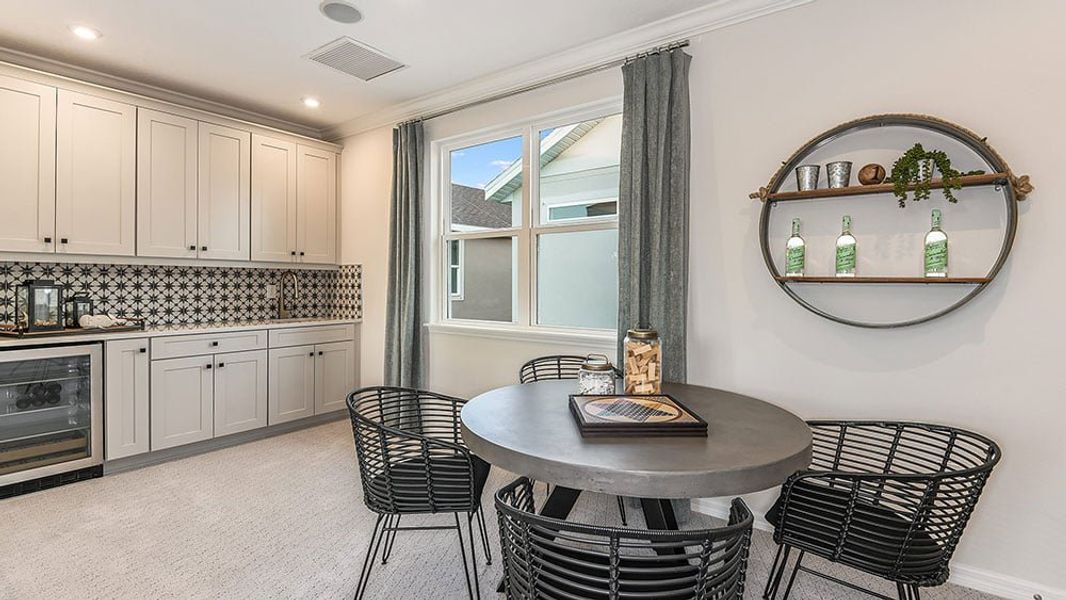 Representative furnished interior of a home built from the Newberry by Taylor Morrison in Harvest at Ovation, Winter Garden (Image 13).