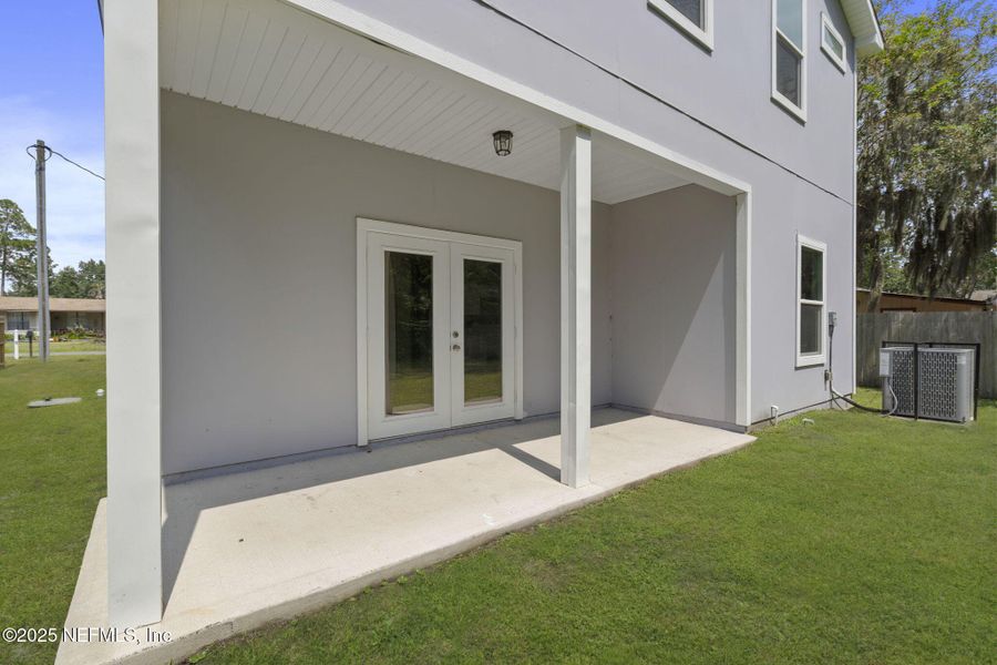 Front exterior of a new home in , Fleming Island, FL, highlighting curb appeal (Image 17).