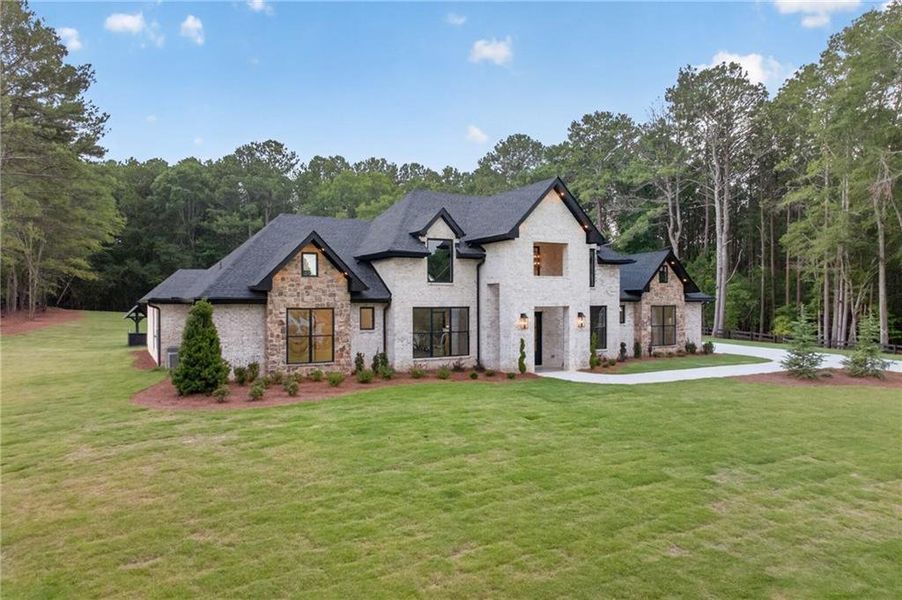 Front exterior of a new home in , Monroe, GA, highlighting curb appeal (Image 29).