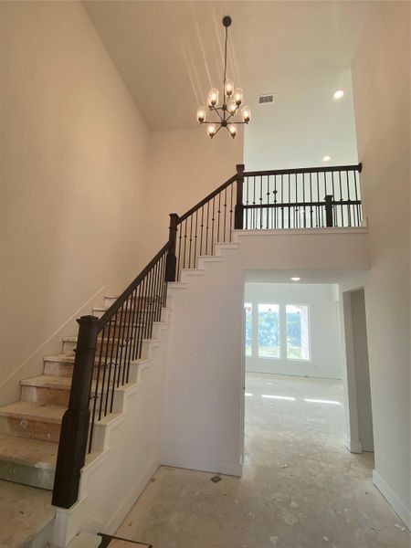 Gorgeous staircase at entry of Home