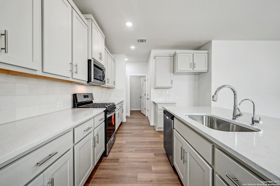 Furnished interior view inside a new home in Avondale, San Antonio (Image 11). Furnished interior view inside a new home in Avondale, San Antonio (Image 11).