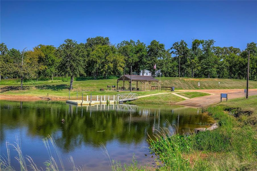 Community amenities include boat launch, pavilion and swimming deck